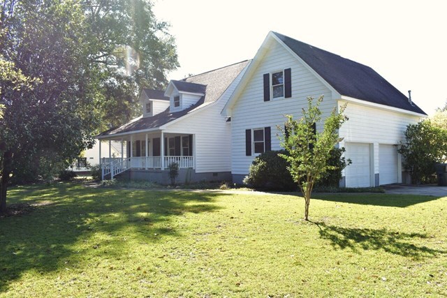 4430 Jones Road Macon, GA 31216 - Photo 1 of 28 a front view of a house with a yard