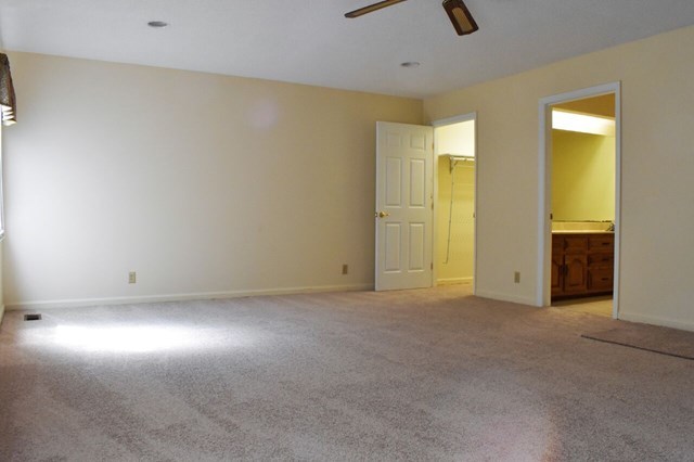 4430 Jones Road Macon, GA 31216 - Photo 17 of 28 an empty room with closet and windows