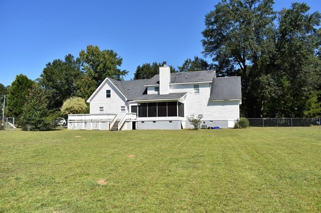 4430 Jones Road Macon, GA 31216 - Photo 28 of 28 a front view of a house with a garden