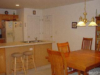 16743 Country Ridge Lane, Unit 95 Macomb, MI 48044 - Photo 9 of 14 Dining Room & Kitchen