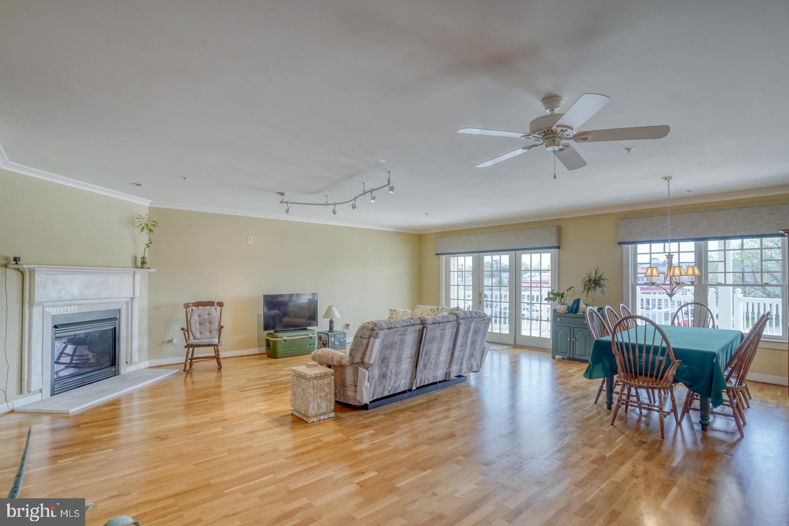 110 Anglers Road, Unit 204 Lewes, DE 19958 - Photo 28 of 32 Living area opens to LARGE DECK facing canal