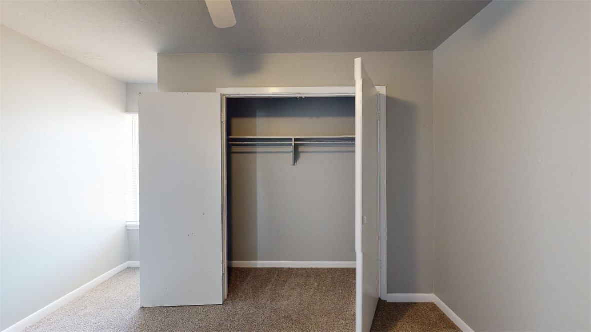 3800 East 29th Street, Unit 15 Bryan, TX 77802 - Photo 14 of 20 a view of walk in closet with empty racks