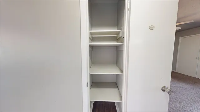 a hallway with a closet
