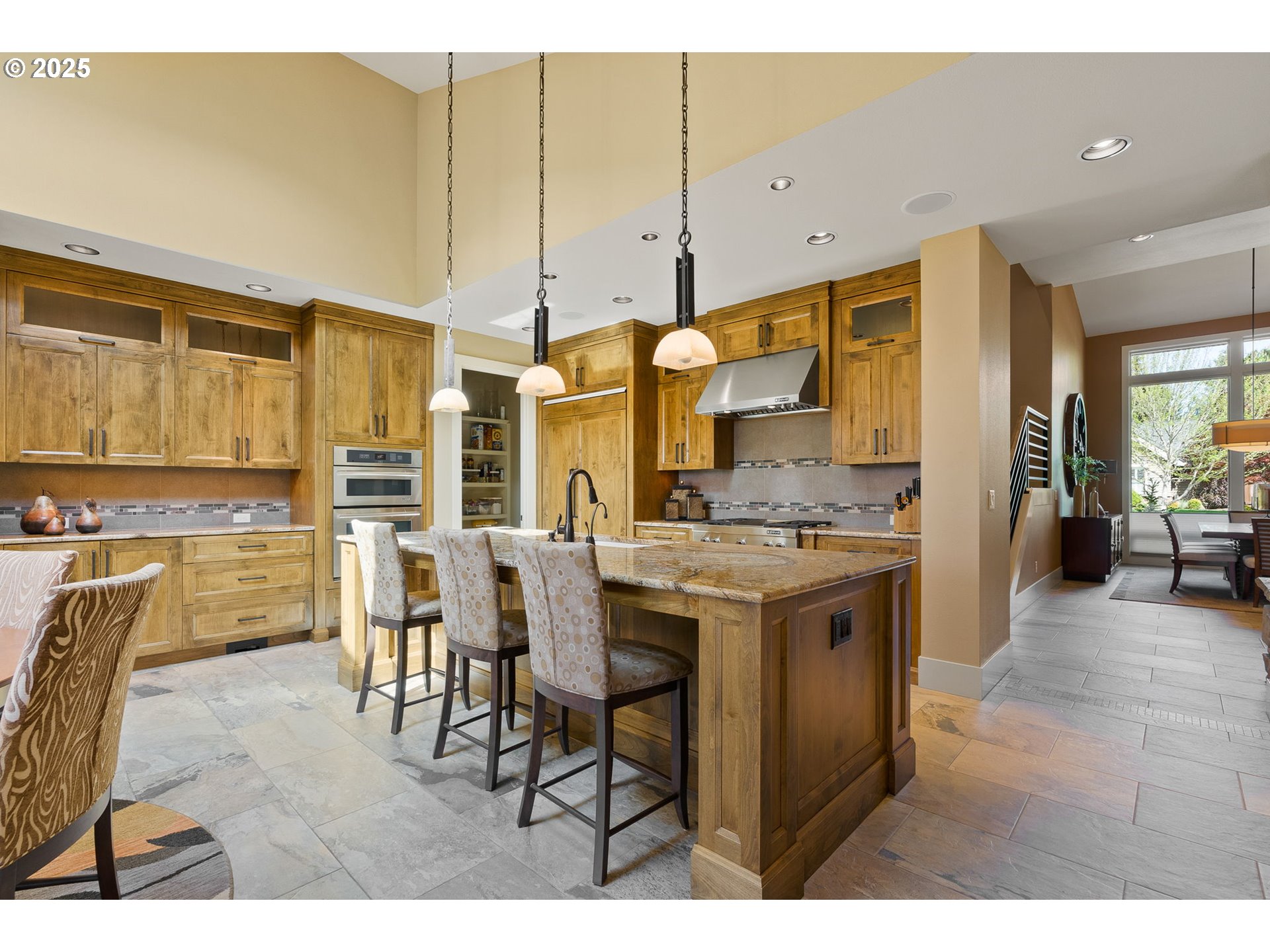 14217 155th Terrace Portland, OR 97224 - Photo 15 of 41 a kitchen with a table and chairs