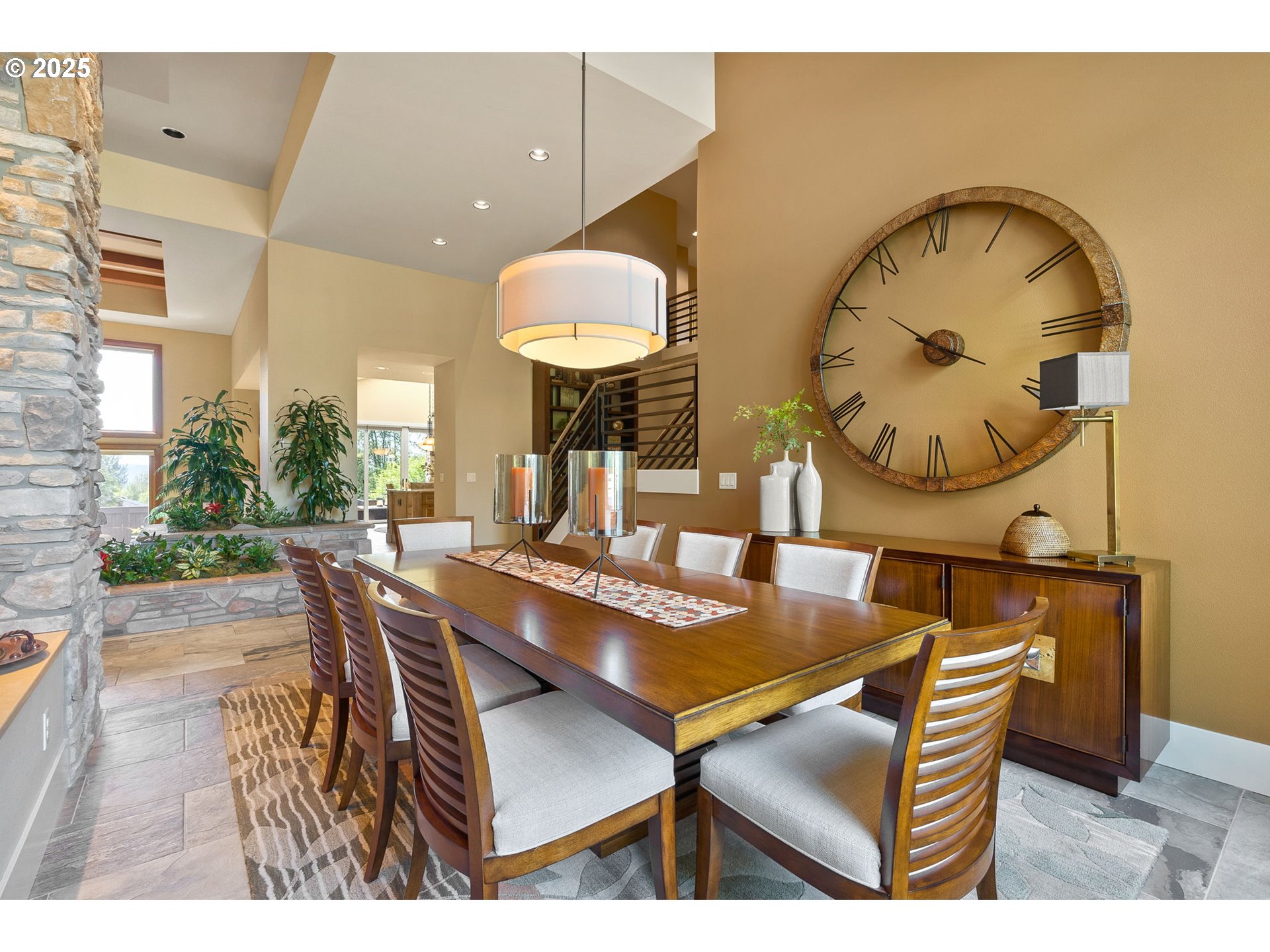 14217 155th Terrace Portland, OR 97224 - Photo 20 of 41 a view of a dining room with furniture and a chandelier