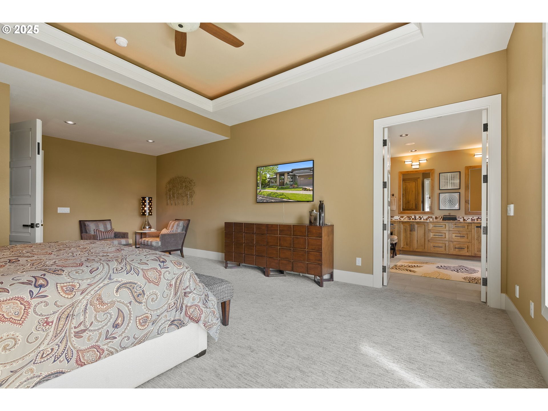 14217 155th Terrace Portland, OR 97224 - Photo 23 of 41 a bedroom with a bed and a large mirror