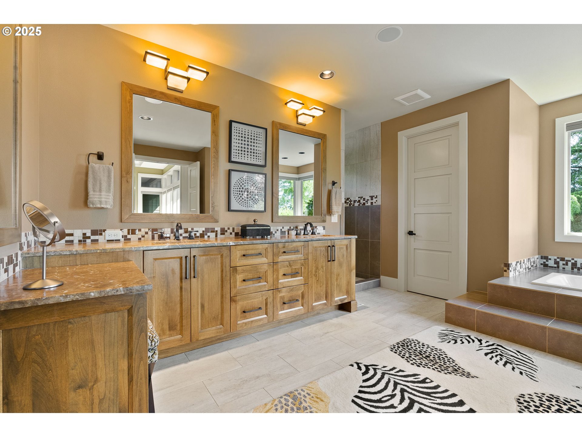 14217 155th Terrace Portland, OR 97224 - Photo 24 of 41 a bathroom with a sink a mirror and a bathtub