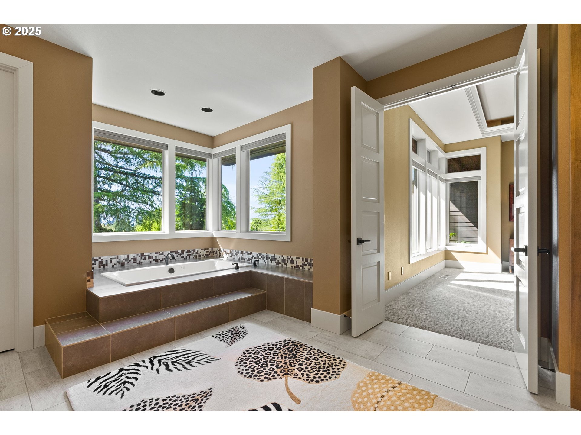 14217 155th Terrace Portland, OR 97224 - Photo 25 of 41 a picture of a floor to ceiling window and a wooden floor