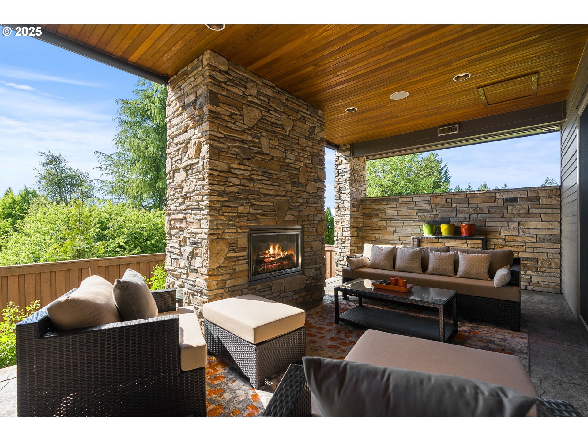 14217 155th Terrace Portland, OR 97224 - Photo 3 of 41 a outdoor living space with furniture and a fireplace