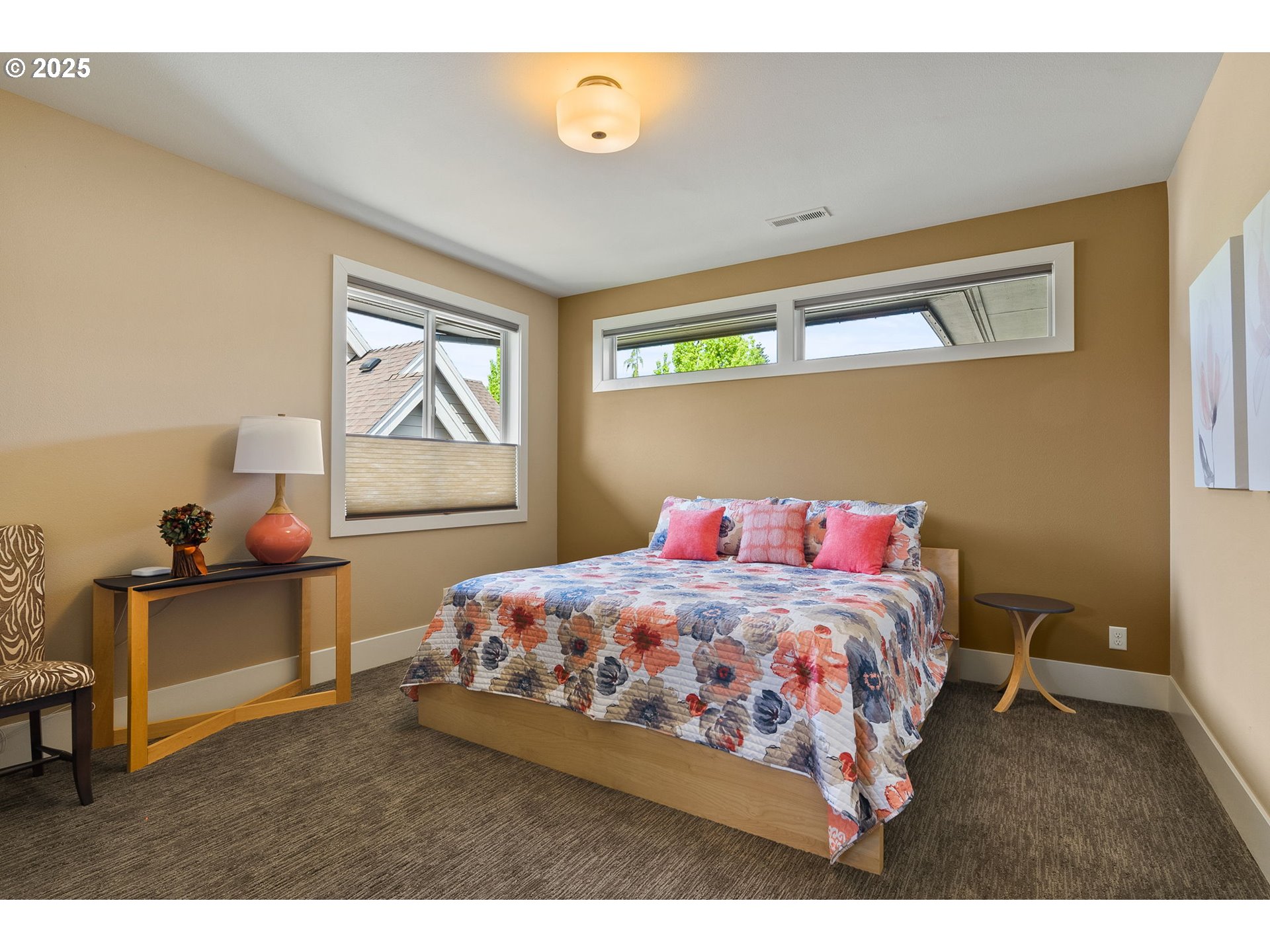 14217 155th Terrace Portland, OR 97224 - Photo 35 of 41 a bedroom with a bed and wooden floor