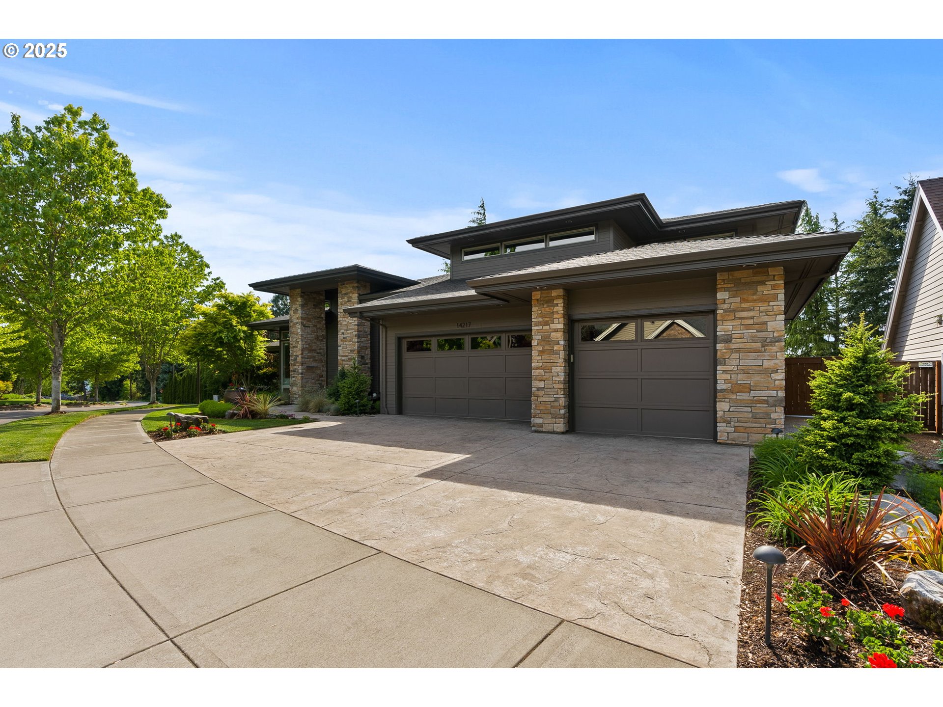 14217 155th Terrace Portland, OR 97224 - Photo 40 of 41 a front view of a house with a garage