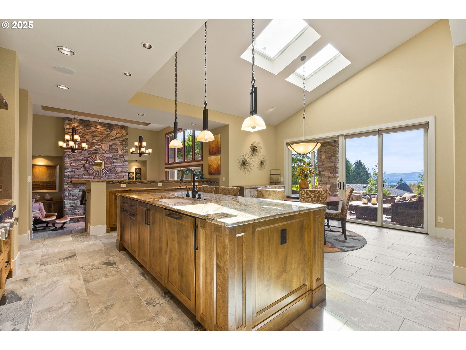 14217 155th Terrace Portland, OR 97224 - Photo 6 of 41 a open kitchen with stainless steel appliances granite countertop a stove and cabinets