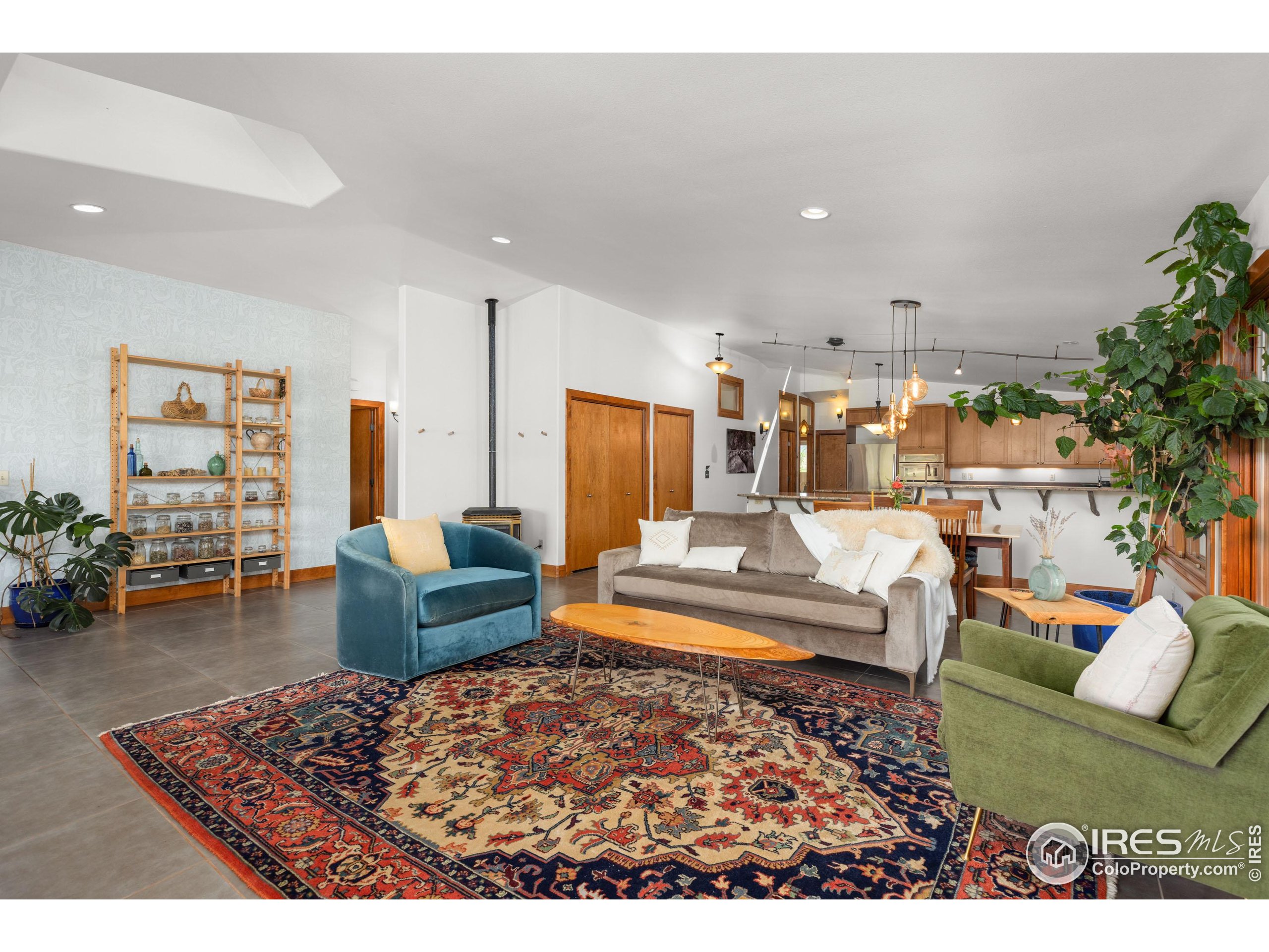108 Lone Star Road Lyons, CO 80540 - Photo 12 of 38 a living room with furniture and a couch