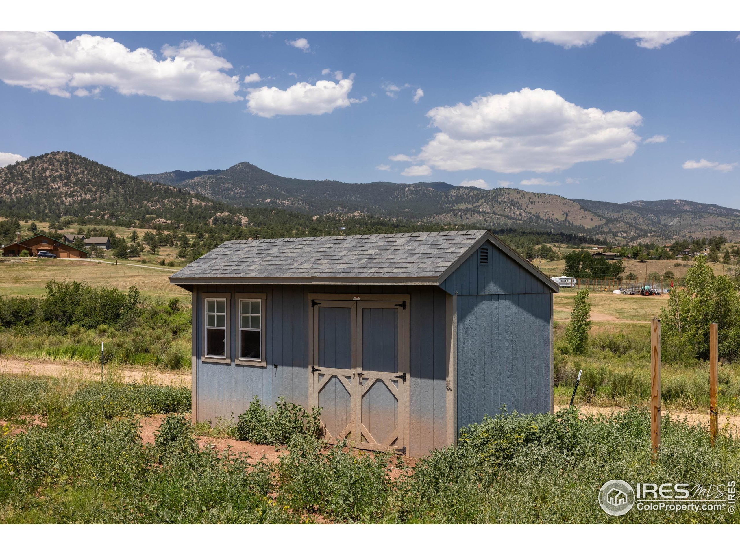 108 Lone Star Road Lyons, CO 80540 - Photo 31 of 38 a house view with a garden