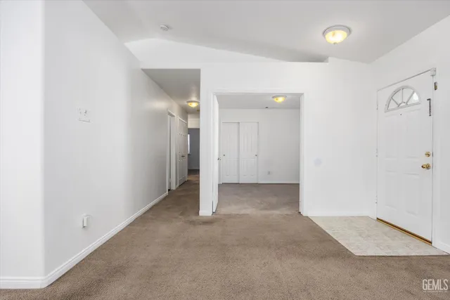 an empty room with a bathroom