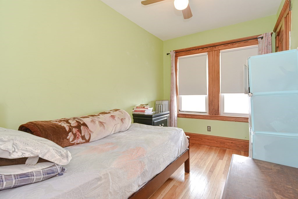 16 Rosedale Avenue Everett, MA 02149 - Photo 16 of 29 a bedroom with a bed and a window