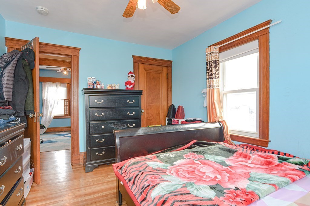 16 Rosedale Avenue Everett, MA 02149 - Photo 20 of 29 a bed room with a bed and a television