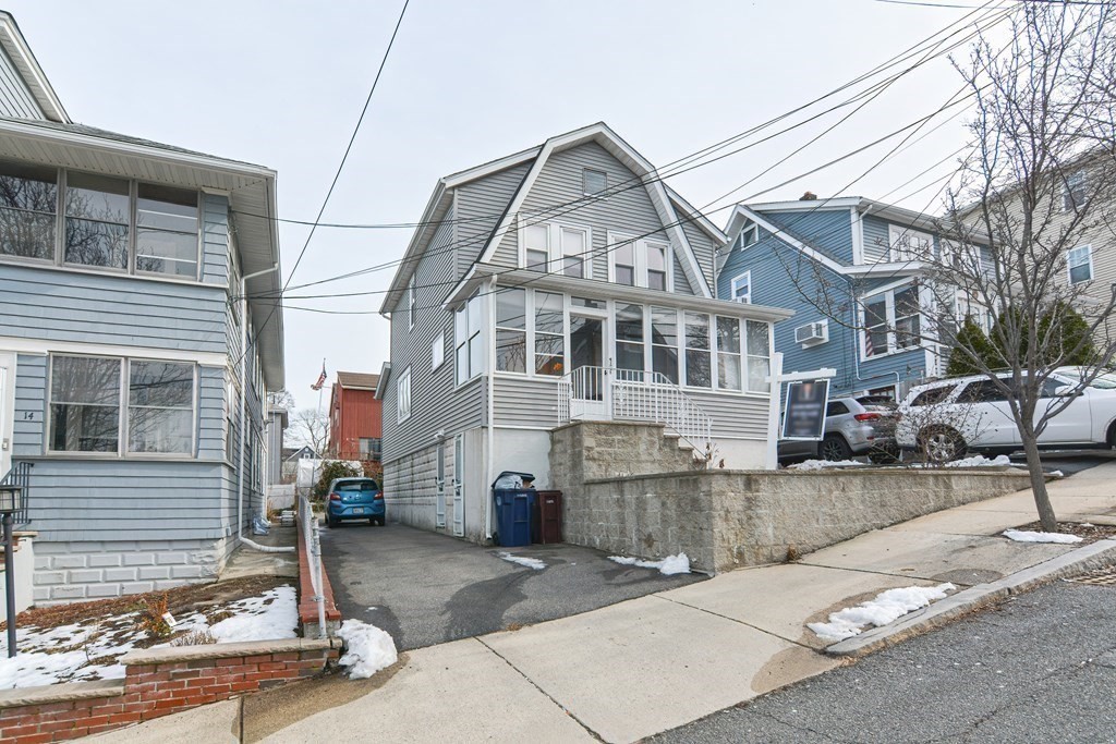16 Rosedale Avenue Everett, MA 02149 - Photo 2 of 29 a front view of a house with a garden