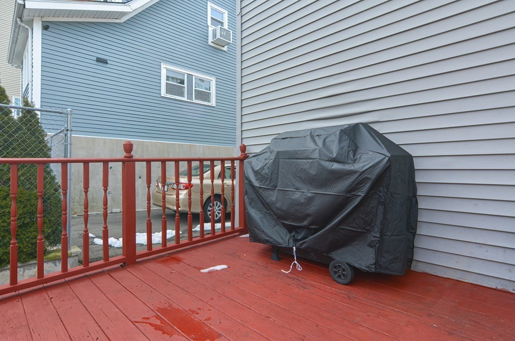 16 Rosedale Avenue Everett, MA 02149 - Photo 28 of 29 a view of a chairs on the deck