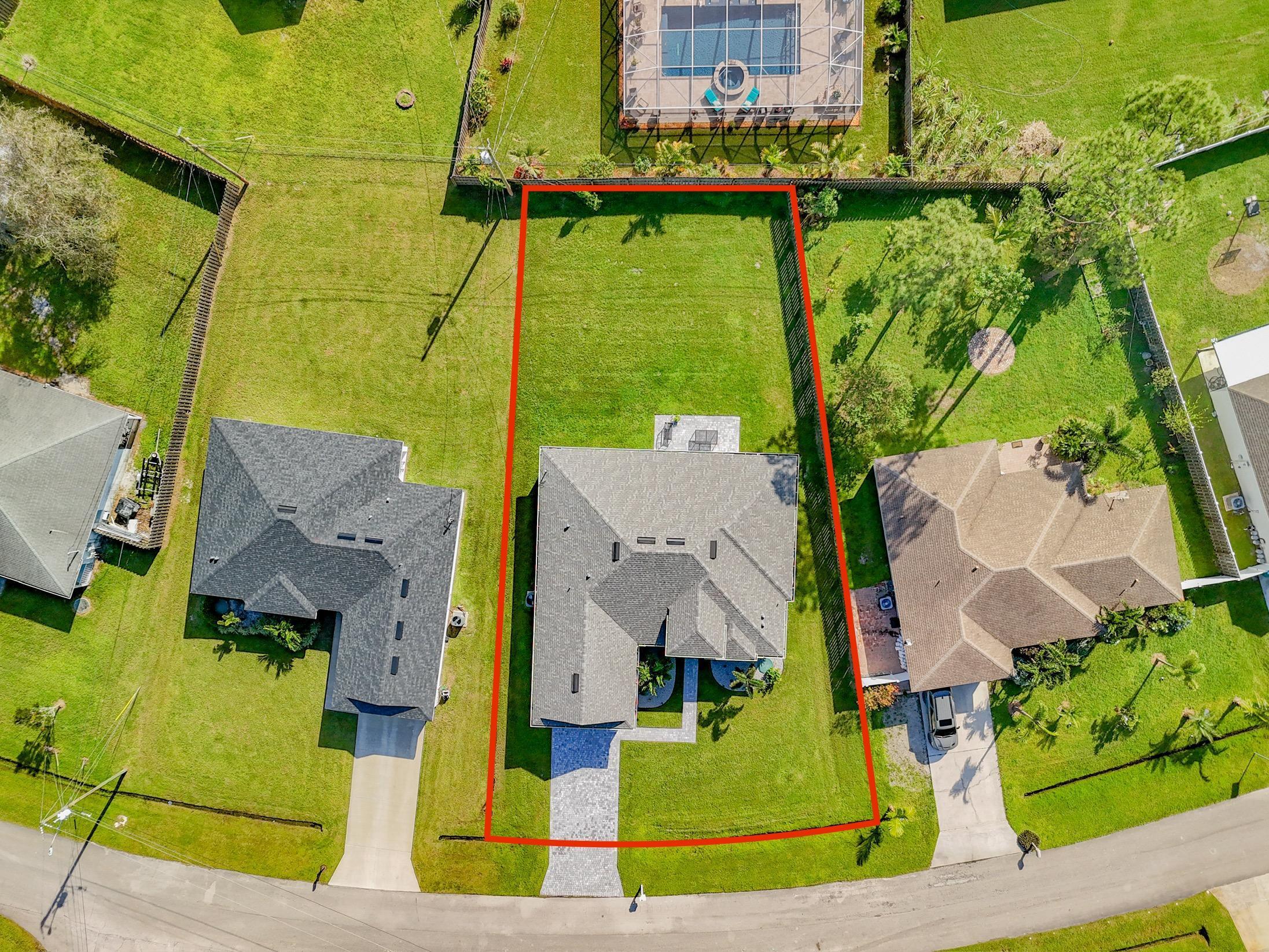 148 Southwest Sea Lion Road Port St. Lucie, FL 34953 - Photo 40 of 42 dji_fly_20241023_153716_0345_17297869051