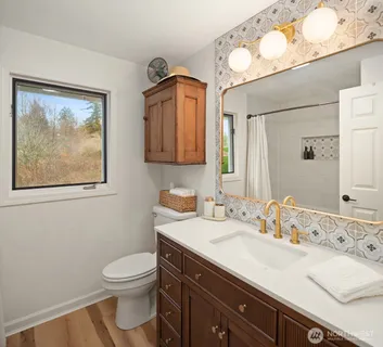 a view of a workspace with furniture