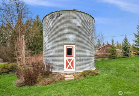 a view of a park with large trees