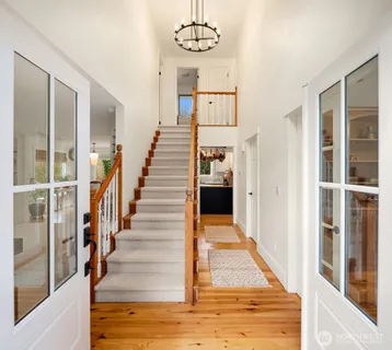 a room with furniture and wooden floor