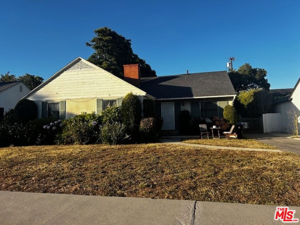 3268 Butler Avenue Los Angeles, CA 90066 - Photo 1 of 1 a front view of a house with a yard