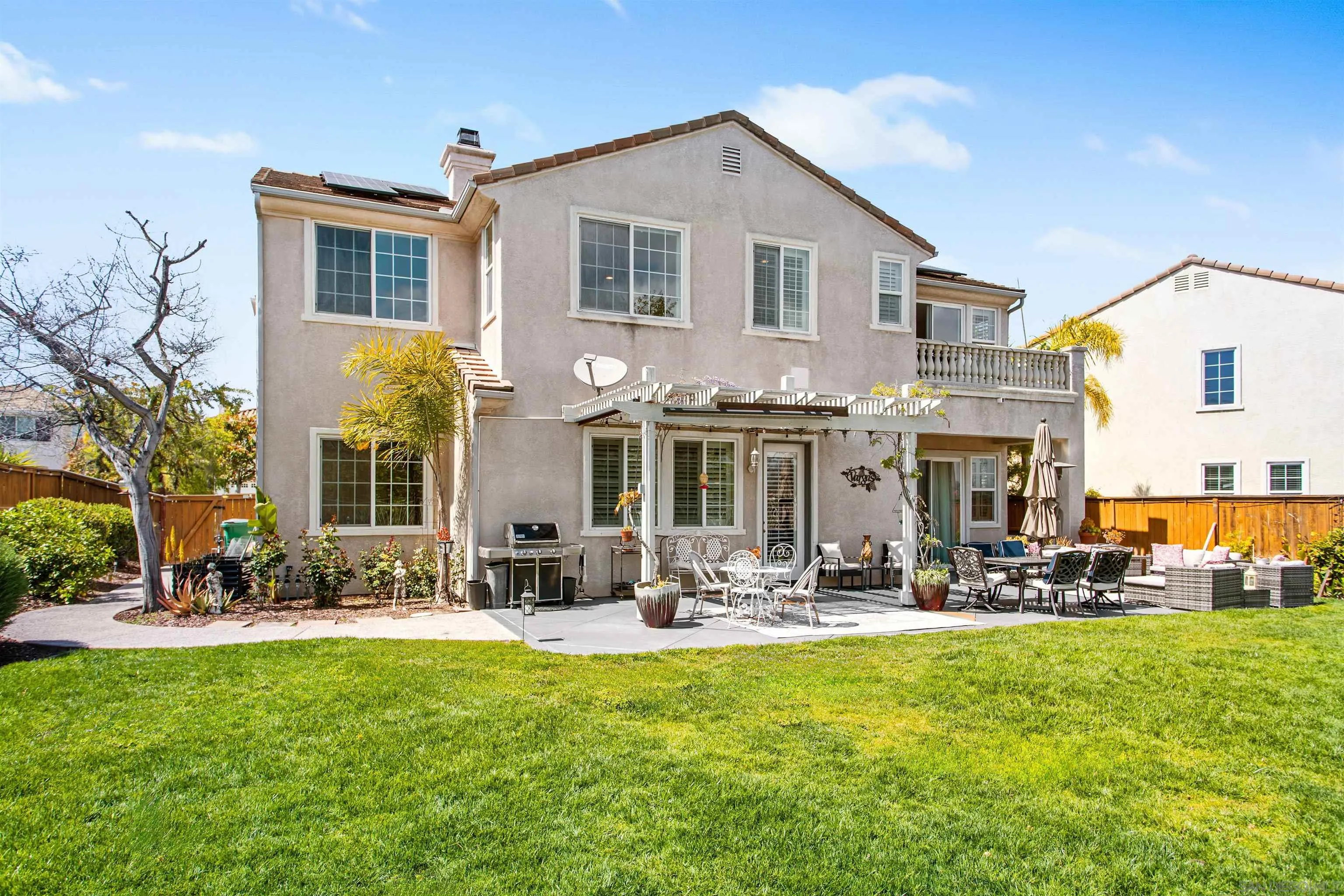 1284 Panorama Ridge Road Oceanside, CA 92056 - Photo 2 of 45 a front view of a house with patio