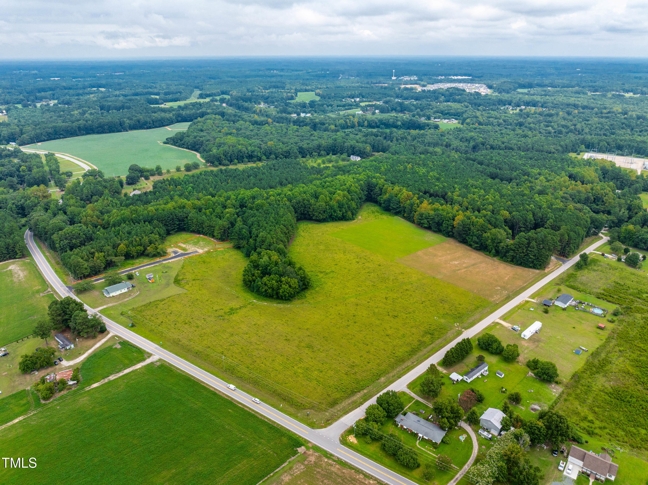 63 Rice Road Zebulon, NC 27597 - Photo 19 of 22 a view of a tennis court