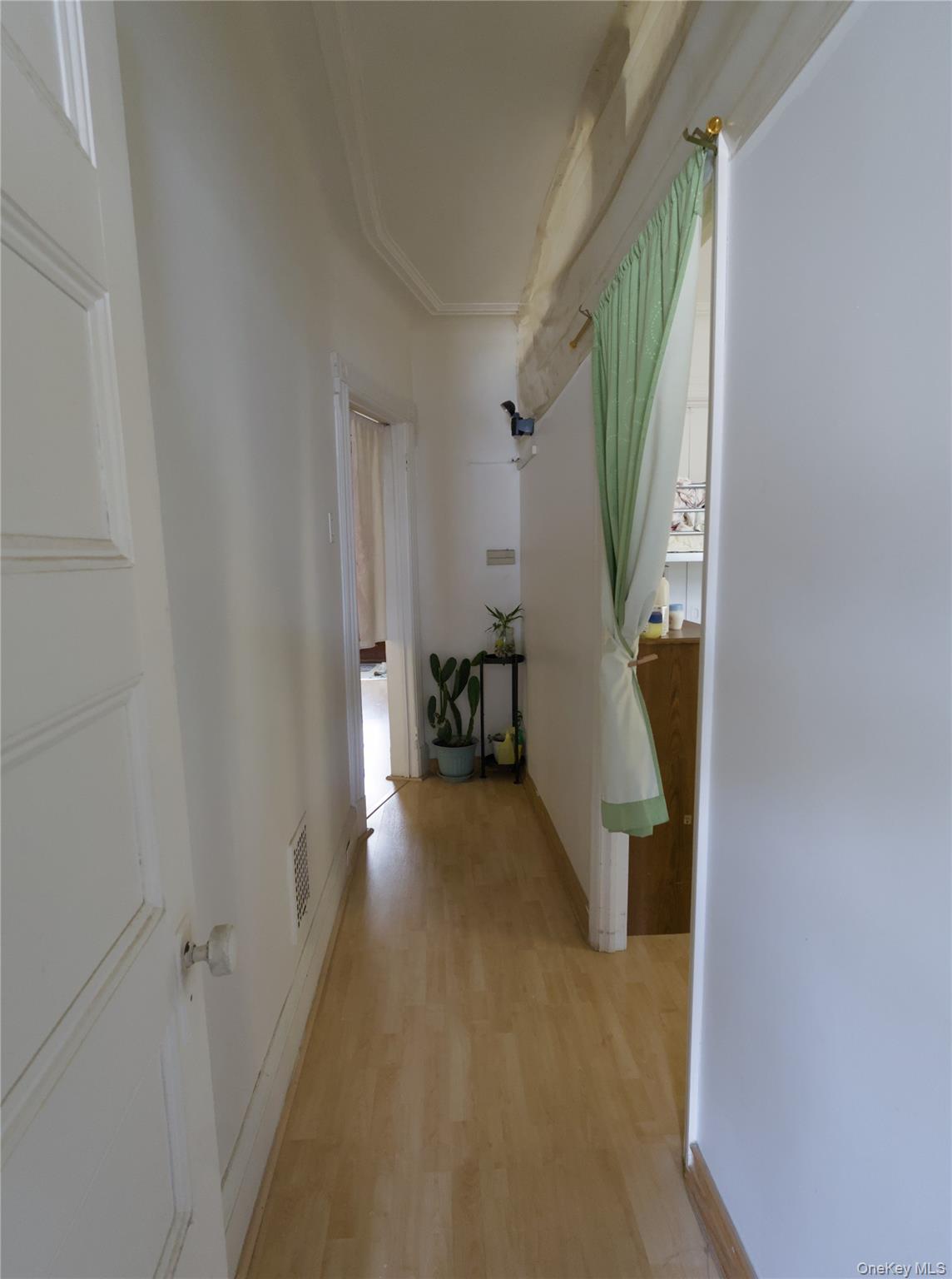 86-24 79th Street Queens, NY 11421 - Photo 12 of 31 a view of a hallway with furniture and entryway