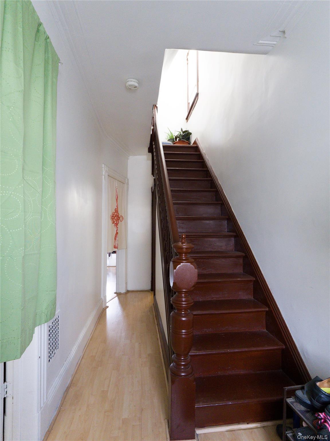86-24 79th Street Queens, NY 11421 - Photo 19 of 31 a view of entryway and hall with wooden floor