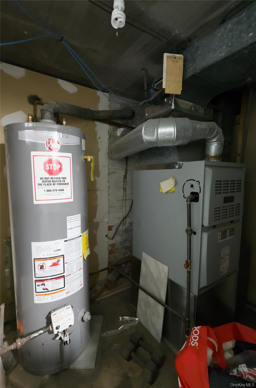 86-24 79th Street Queens, NY 11421 - Photo 24 of 31 a view of storage and utility room