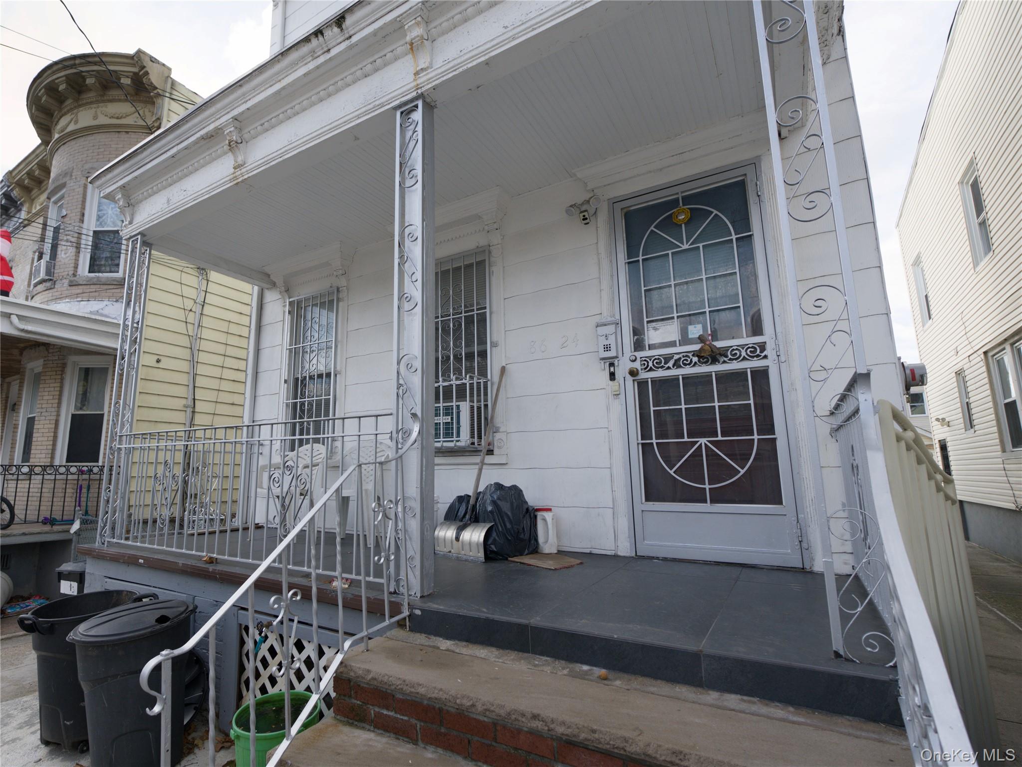 86-24 79th Street Queens, NY 11421 - Photo 25 of 31 a view of entryway and hall with wooden floor