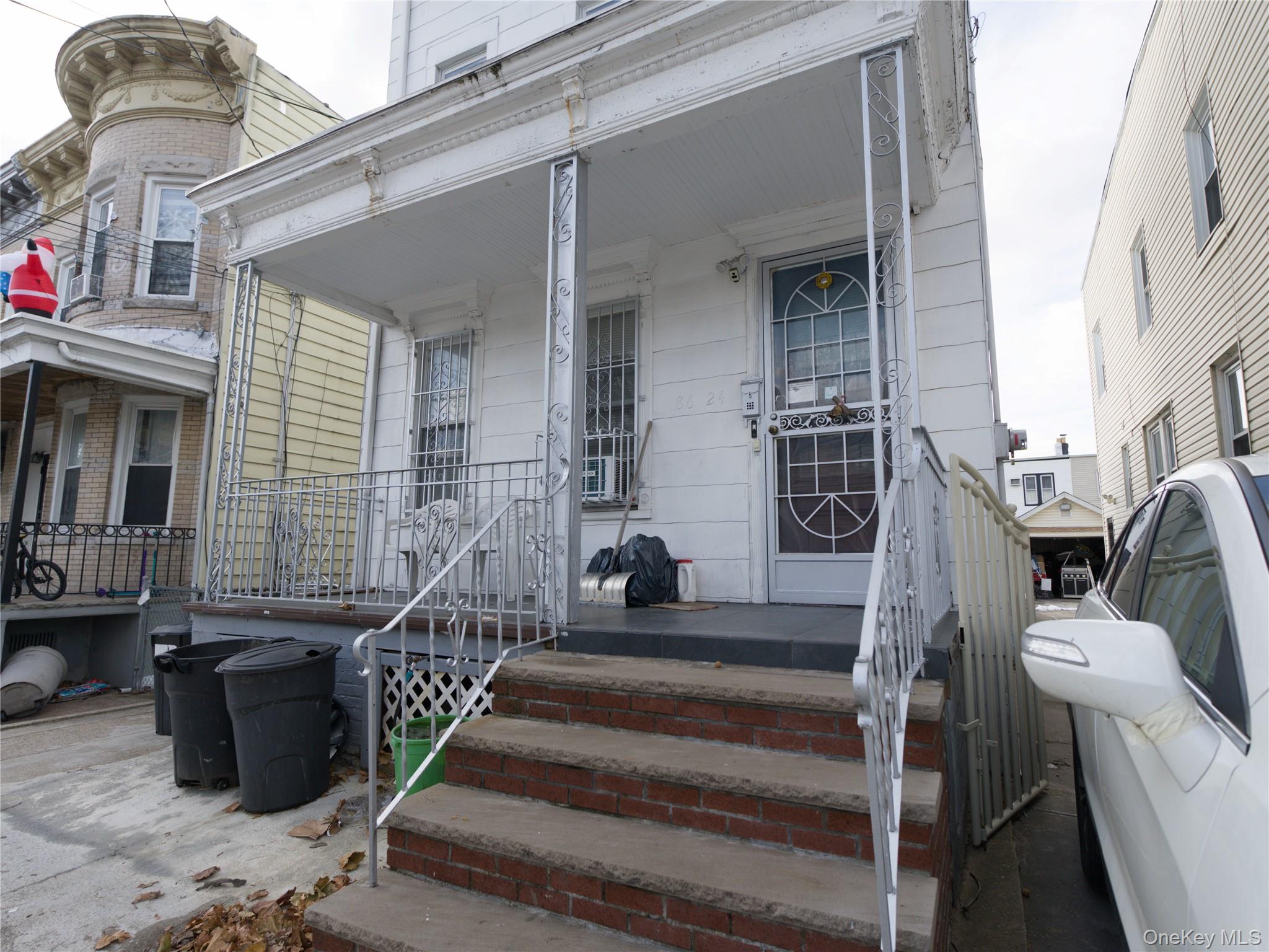 86-24 79th Street Queens, NY 11421 - Photo 26 of 31 a view of a balcony with chairs