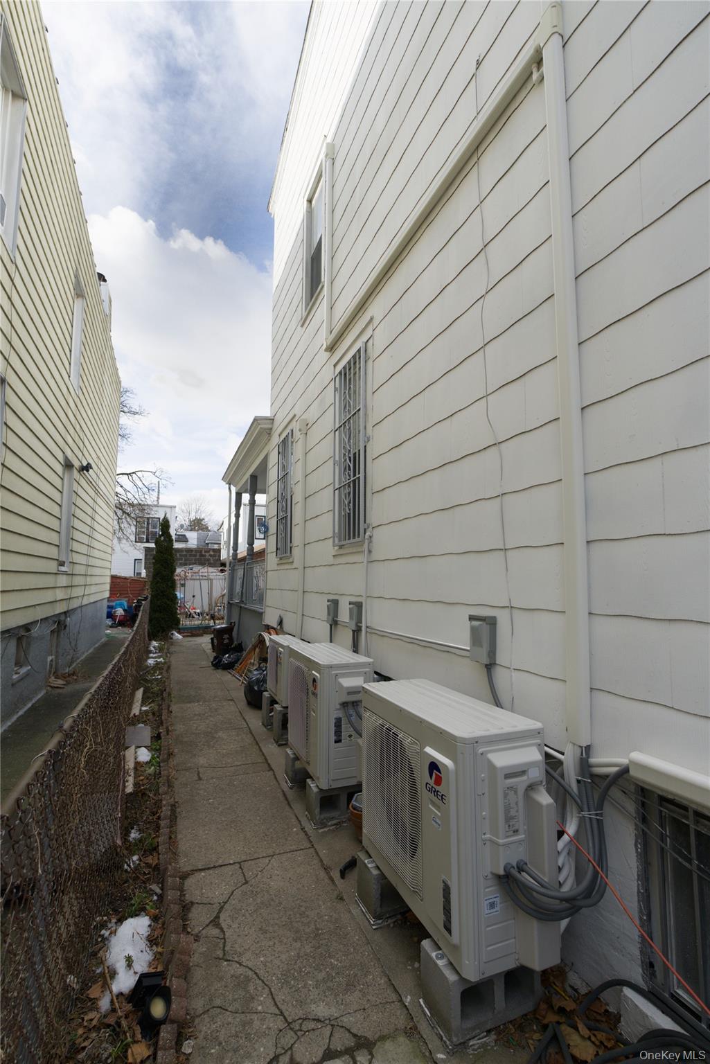 86-24 79th Street Queens, NY 11421 - Photo 31 of 31 a utility room with multiple dryer and washer