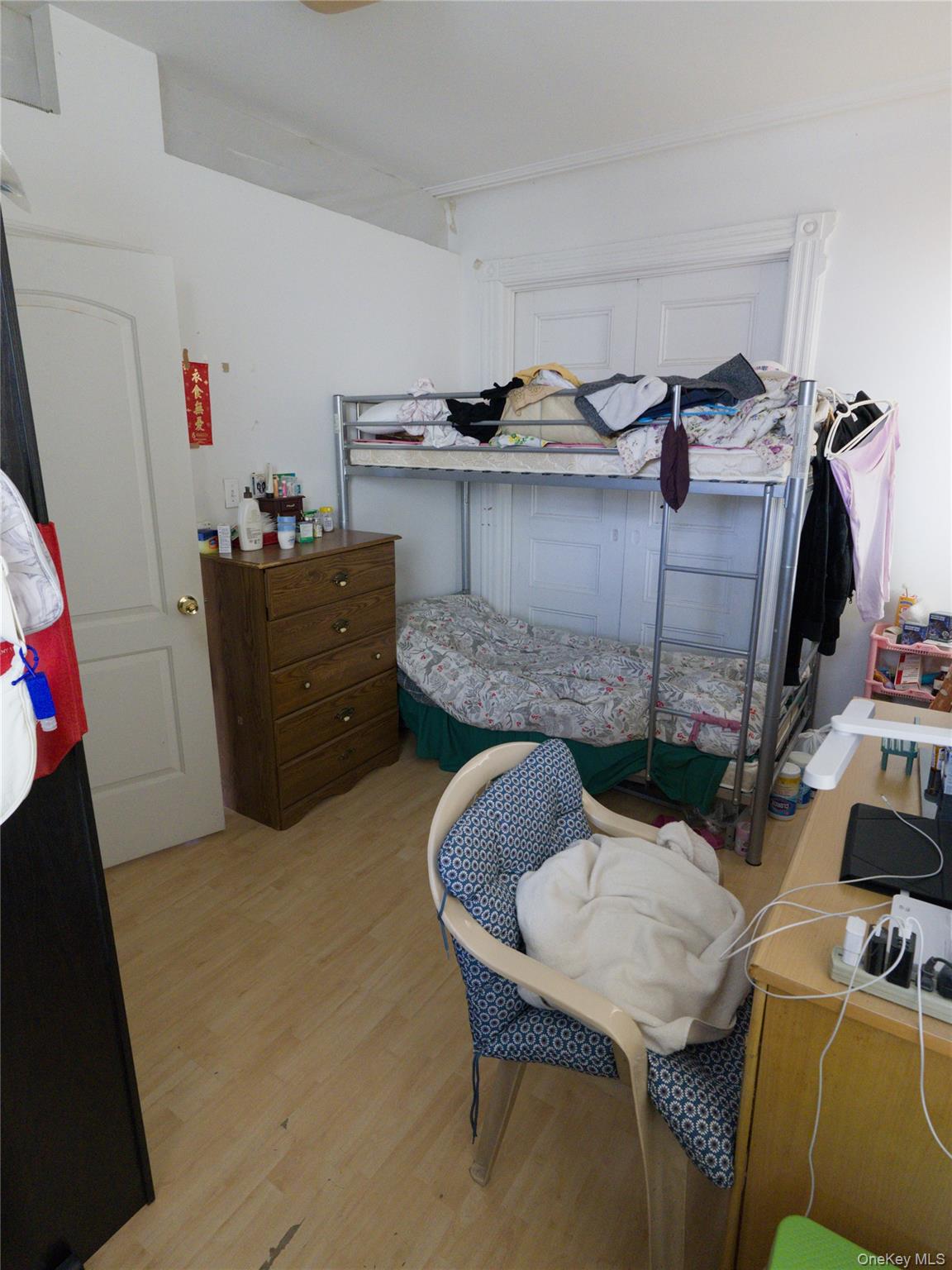 86-24 79th Street Queens, NY 11421 - Photo 8 of 31 a living room with furniture and a flat screen tv