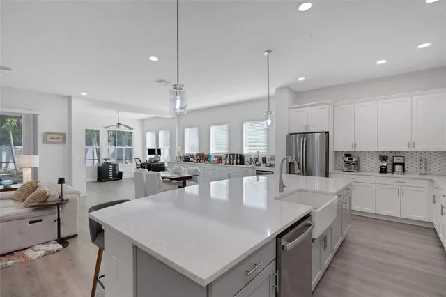 a bedroom with a bed and with furniture