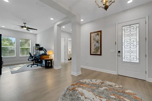 a view of a living room and hardwood floor