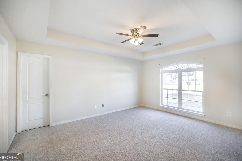 204 Chimney Rock Road Perry, GA 31069 - Photo 15 of 28 a view of an empty room with a window