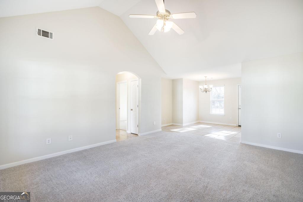 204 Chimney Rock Road Perry, GA 31069 - Photo 6 of 28 a view of empty room with fan