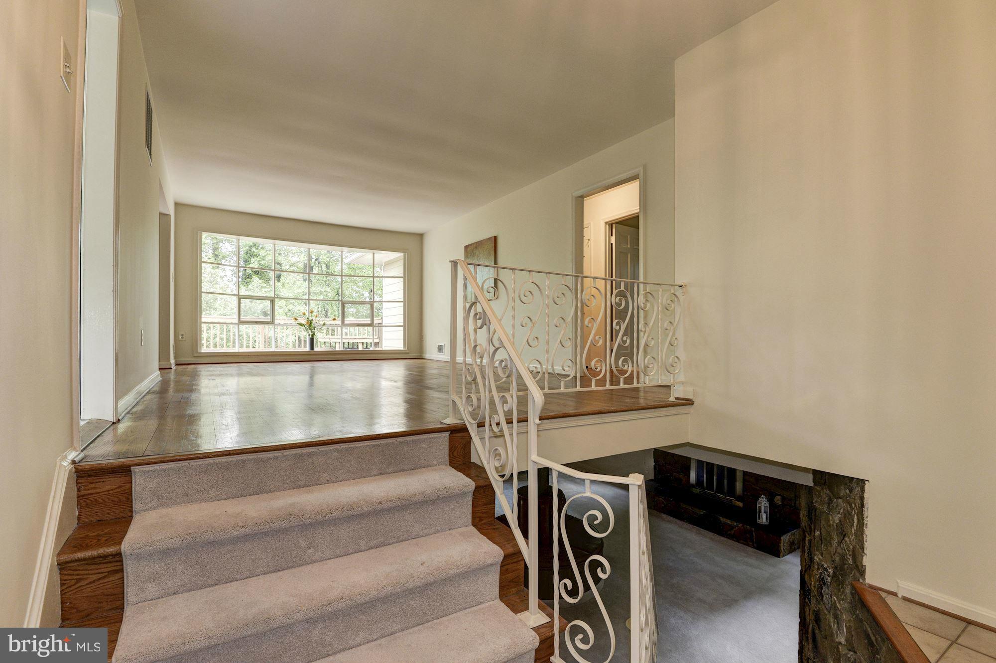 1305 Forestwood Drive McLean, VA 22101 - Photo 3 of 30 a view of entryway and hall with wooden floor