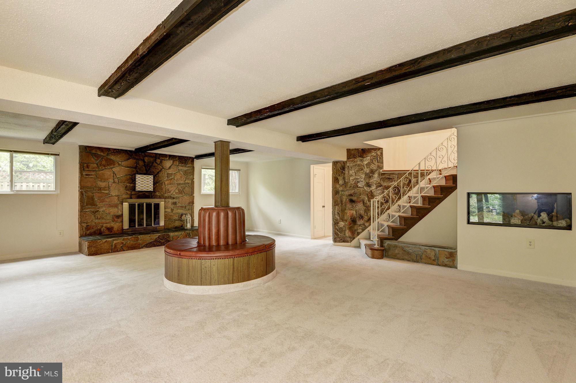 1305 Forestwood Drive McLean, VA 22101 - Photo 21 of 30 a view of a livingroom with furniture and a flat screen tv