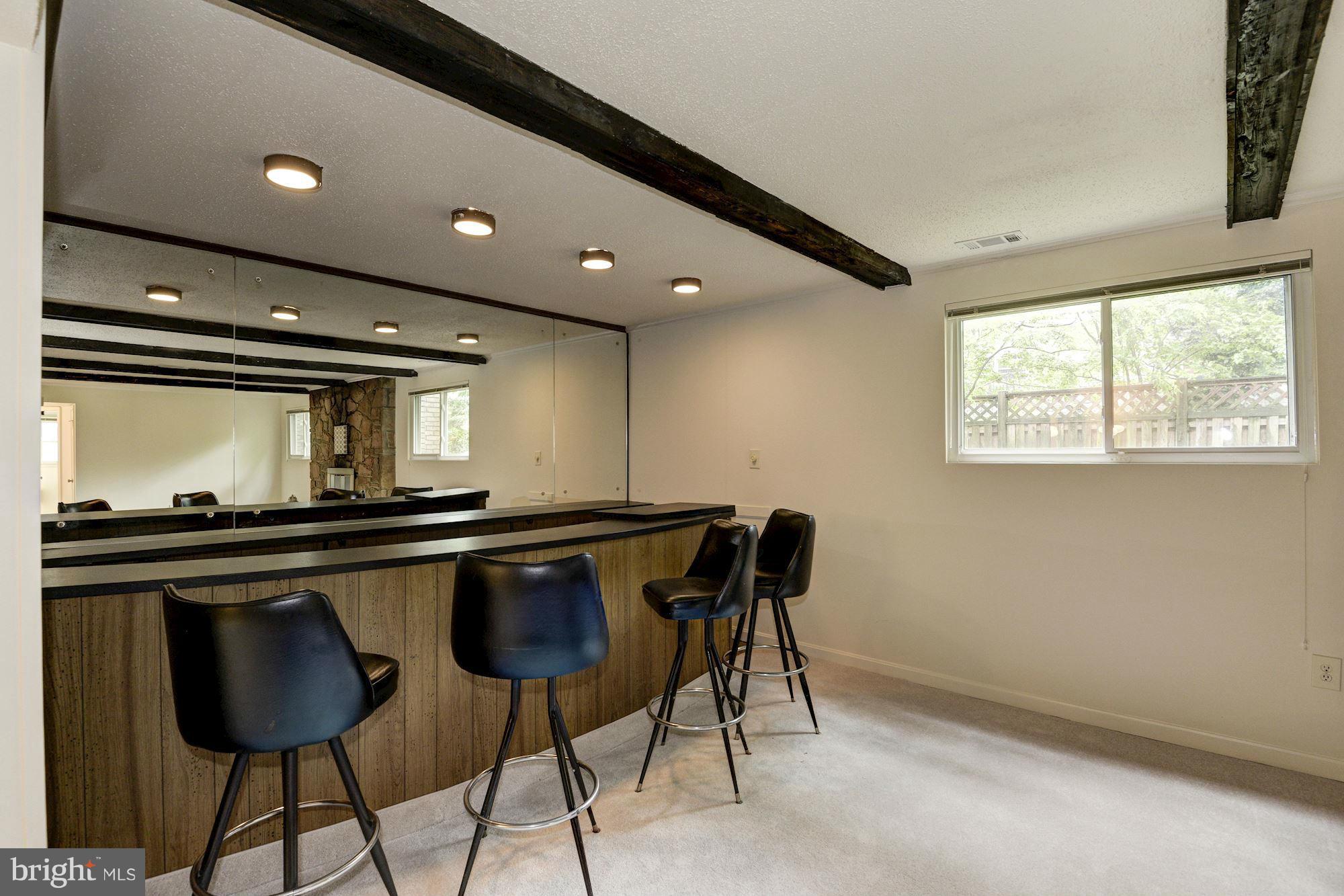 1305 Forestwood Drive McLean, VA 22101 - Photo 23 of 30 a kitchen with stainless steel appliances granite countertop a sink and a stove