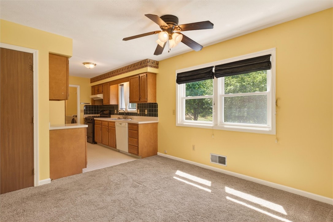 479 Churchville Riga Road Riga, NY 14428 - Photo 9 of 50 DINING ROOM INTO THE KITCHEN