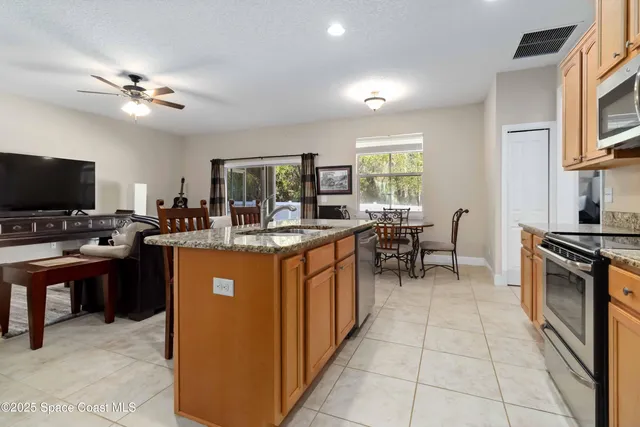 a view of a dining room with furniture
