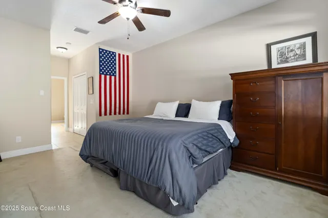 a bathroom with a sink toilet and window