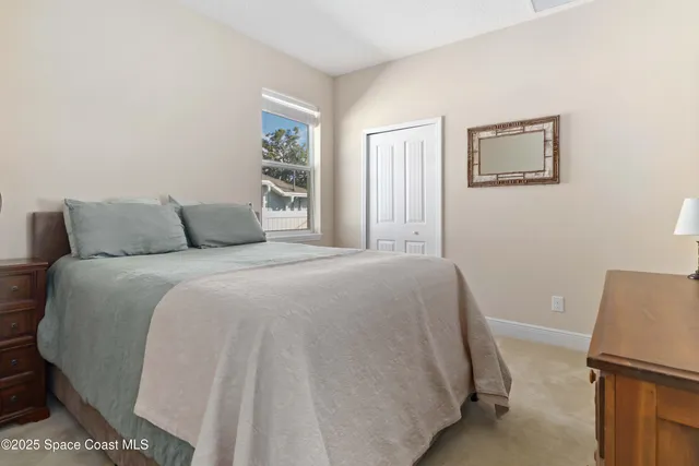 a view of a chairs and table in patio