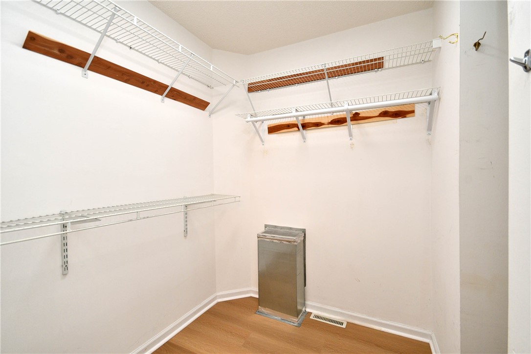 103 Baldwin Place Easley, SC 29642 - Photo 41 of 42 This versatile space features ample storage with shelving and a durable wood floor.
