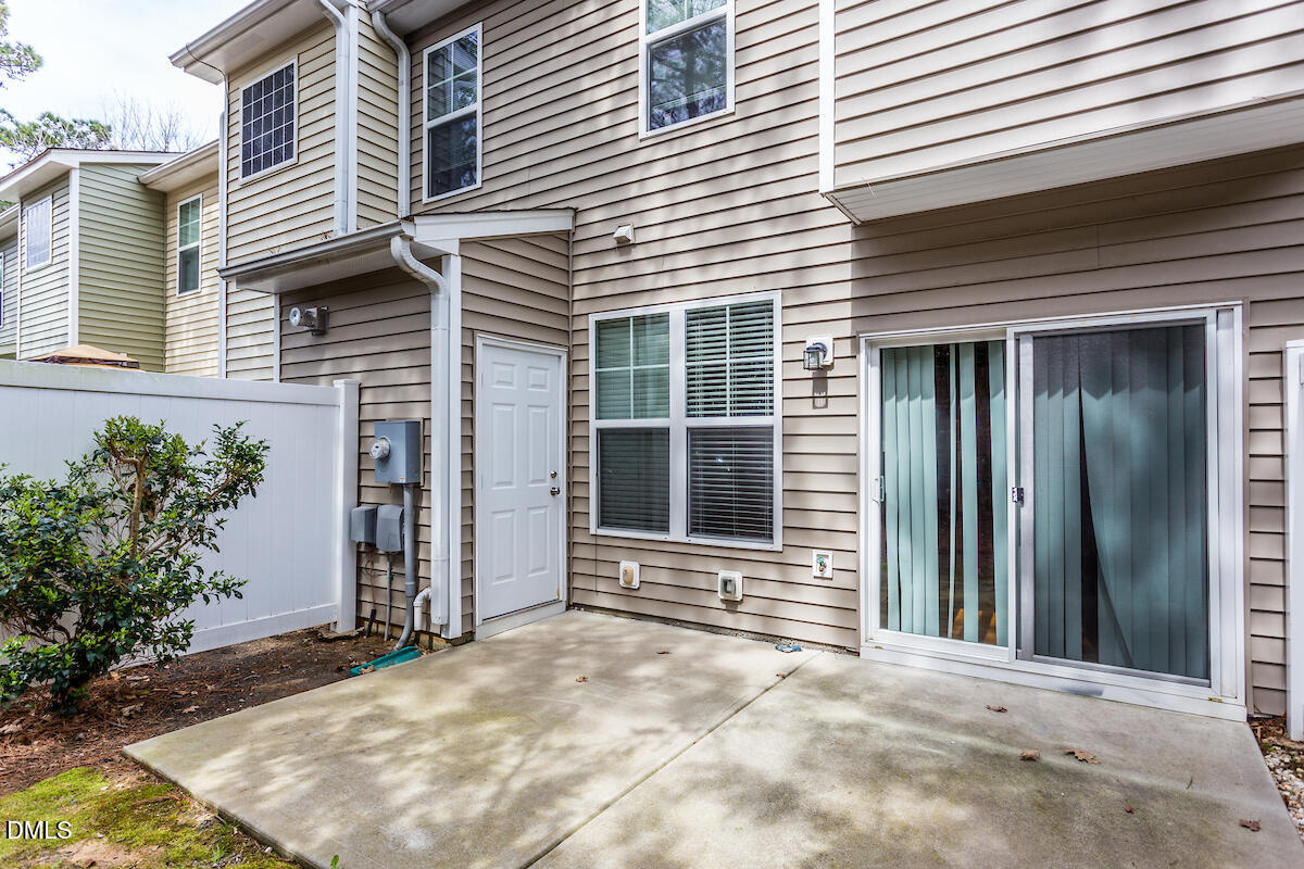 4620 Pat Reed Road Raleigh, NC 27616 - Photo 21 of 21 a view of a house with backyard and potted plants